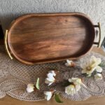 صينية خشب هندي بيضاوي مع يد جذع شجرة نحاس